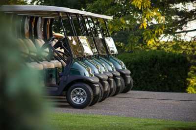 A line of golf carts